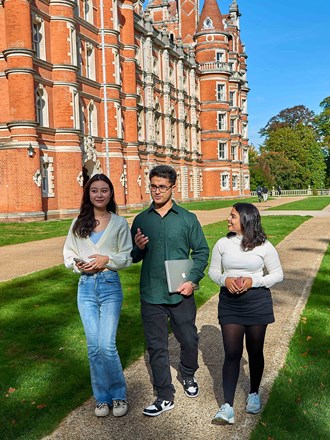 Students walking outside Royal Holloway Law School Students walking outside Royal Holloway Law School